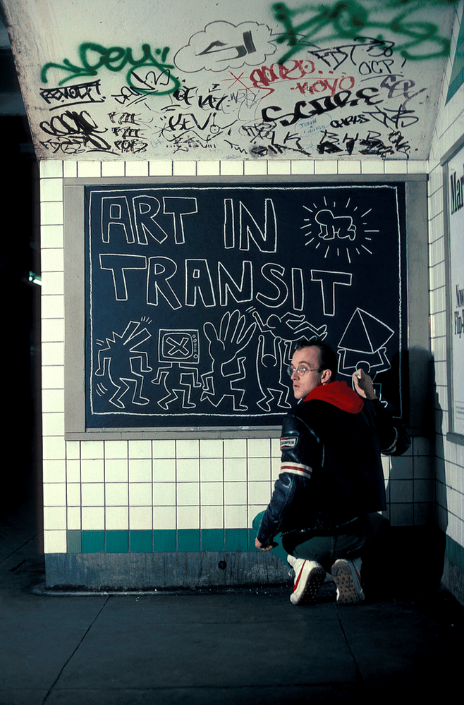 Keith Haring in New York City Subway, New York, 1984. Photograph: Tseng Kwong Chi © Muna Tseng Dance Projects. Art © Keith Haring Foundation. Image courtesy of National Gallery of Victoria.