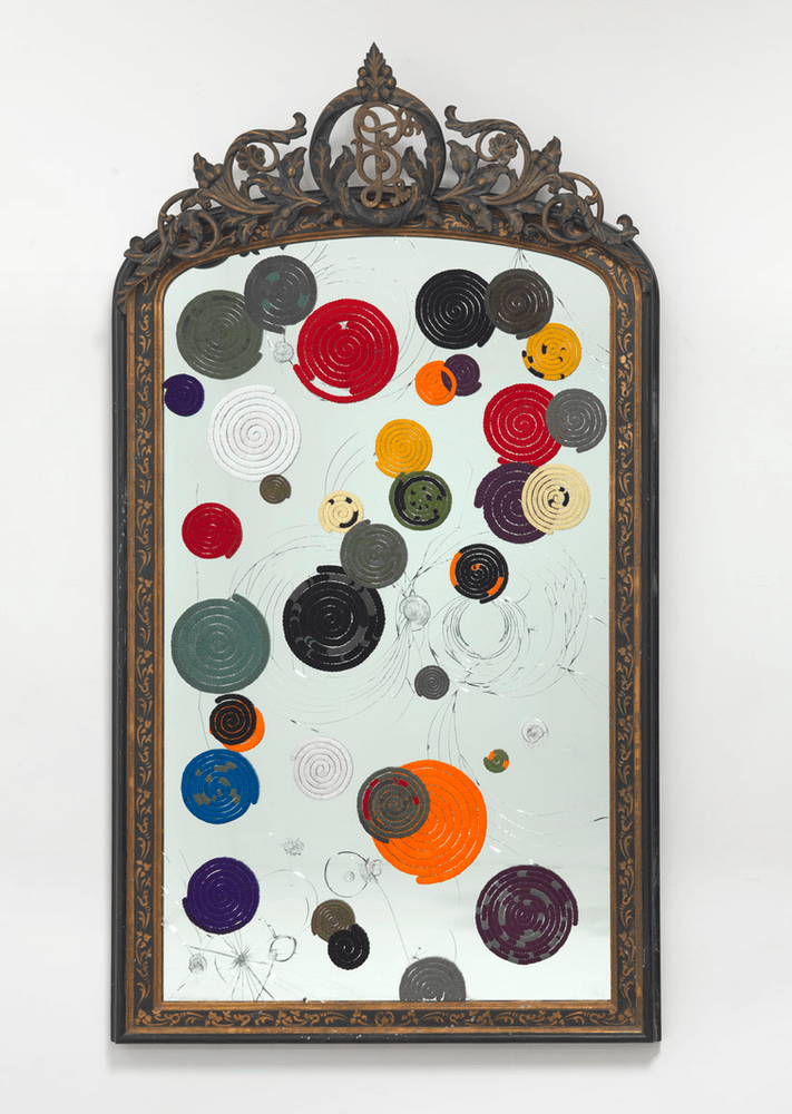 Bharti Kher. Indra's Net Series. Bindis, mirror, wooden frame. 194 x 113 cm. 2010. Courtesy: Bharti Kher.